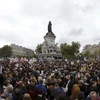 Người dân Pháp tham gia cuộc tuần hành ủng hộ người di cư tại Paris ngày 5/9. (Nguồn: AFP/TTXVN) 