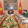 Bộ trưởng Quốc phòng Việt Nam điện đàm với Bộ trưởng Quốc phòng Trung Quốc. (Ảnh: Trọng Đức/TTXVN)