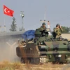 Quân đội Thổ Nhĩ Kỳ triển khai lực lượng trên đường biên giới với Syria. (Ảnh: billyburtonblogs.wordpress.com)