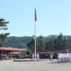 Quang cảnh lễ thượng cờ tại lễ kỷ niệm. (Ảnh: Lâm Khánh/Vietnam+)