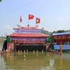 Tiết mục "Câu ếch" do phường rối nước Thanh Hải, huyện Thanh Hà biểu diễn. (Ảnh: Mạnh Minh/TTXVN) 