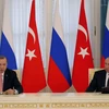 Tổng thống Nga Vladimir Putin (phải) và Tổng thống Thổ Nhĩ Kỳ Recep Tayip Erdogan tại cuộc họp báo sau cuộc gặp. (Nguồn: EPA/TTXVN) 