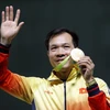 Đại tá Hoàng Xuân Vinh, vận động viên giành Huy chương Vàng đầu tiên của thể thao Việt Nam trên đấu trường Olympic. (Nguồn: TTXVN)