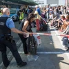 Cảnh sát Đức được tăng cường tại sân bay Frankfurt ngày 31/8. (Nguồn: EPA/TTXVN)