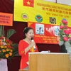 Chủ tịch Hội Đồng hương Tương trợ Việt Nam tại Macau, Bà Trần Thị Thu phát biểu tại míttinh. (Nguồn: Vietnam+)