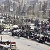 Người dân Syria sơ tán khỏi các khu vực do lực lượng nổi dậy kiểm soát ở phía đông thành phố Aleppo ngày 10/12. (Nguồn: AFP/TTXVN) 