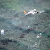 Mảnh vỡ của máy bay MV-22 Osprey gặp nạn trên vùng biển ngoài khơi Nago, Okinawa ngày 14/12. (Nguồn: AP/TTXVN)