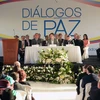 Chính phủ của Tổng thống Juan Manuel Santos và nhóm Quân đội Giải phóng quốc gia (ELN) đã ra mắt thành viên bàn đàm phán. (Nguồn: EPA/TTXVN)