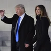 Tổng thống đắc cử Donald Trump (trái) và phu nhân Melania Trump (phải) tại Washington, DC. (Nguồn: AFP/TTXVN) 