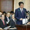 Thủ tướng Nhật Bản Shinzo Abe (giữa). (Nguồn: Kyodo/TTXVN)