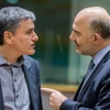 Ủy viên EU phụ trách kinh tế và tài chính Pierre Moscovici (phải) và Bộ trưởng Tài chính Hy Lạp Euclid Tsakalotos (trái). (Nguồn: EPA/TTXVN)