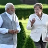 Thủ tướng Đức Angela Merkel (ảnh, phải) đã có cuộc hội đàm với người đồng cấp Ấn Độ Narendra Modi (ảnh, trái). (Nguồn: EPA/TTXVN)