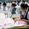 [Photo] 1.000 tình nguyện viên tham gia lập kỷ lục về massage