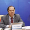Thứ trưởng Bộ Ngoại giao Nguyễn Quốc Dũng tham dự đối thoại ASEAN- New Zealand lần thứ 28 theo hình thức trực tuyến tại điểm cầu Hà Nội. (Ảnh: Dương Giang - TTXVN)