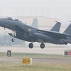 Máy bay chiến đấu F-15 của Không lực Hàn Quốc cất cánh từ căn cứ không quân Daegu. (Ảnh: Korea Times/TTXVN) 