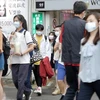 Người dân đeo khẩu trang phòng lây nhiễm COVID-19 tại Hàn Quốc. (Ảnh: BBC)