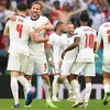 Các cầu thủ Anh mừng chiến thắng sau trận gặp Đức ở vòng 16 đội, EURO 2020 trên sân vận động Wembley ở London, ngày 29/6/2021. (Ảnh: AFP/TTXVN) 