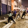 Bạo động nổ ra ở Nam Phi. (Ảnh: The Guardian)
