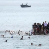 Sáng 22/7, hơn 230 người di cư từ Maroc đã tràn vào vùng lãnh thổ Melilla của Tây Ban Nha.(Nguồn: GettyImages)