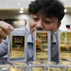 Vàng miếng được trưng bày tại sàn giao dịch ở Seoul, Hàn Quốc. (Nguồn: Yonhap/TTXVN) 