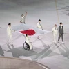 Lễ thượng cờ Nhật Bản tại lễ khai mạc Paralympic Tokyo 2020 ở thủ đô Tokyo. (Ảnh: AFP/TTXVN) 