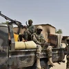 Binh sỹ Niger gác tại một căn cứ quân sự ở Bosso sau một vụ tấn công của Boko Haram, ngày 17/6/2016. (Ảnh: AFP/TTXVN) 