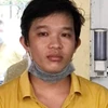 Đối tượng Nguyễn Thanh Tú bị bắt sau gần 2 tháng trốn truy nã. (Ảnh: TTXVN phát)