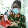 Nữ chiến sỹ Vũ Kim Khánh trong ngày Thành phố Hồ Chí Minh tổ chức lễ tri ân lực lượng hỗ trợ. (Ảnh: TTXVN)