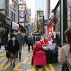 Người dân đeo khẩu trang phòng dịch COVID-19 tại Seoul, Hàn Quốc. (Ảnh: THX/TTXVN)
