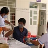 Tiêm vaccine phòng COVID-19 cho người dân xã Đăng Hà, huyện Bù Đăng (Bình Phước). (Ảnh: Sỹ Tuyên/TTXVN) 