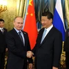 Tổng thống Nga Vladimir Putin và Chủ tịch Trung Quốc Tập Cận Bình. (Nguồn: TASS) 