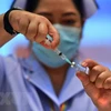 Tiêm vaccine ngừa COVID-19 tại Bangkok, Thái Lan. (Nguồn: AFP/TTXVN) 