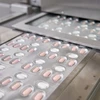 Thuốc Paxlovid điều trị COVID-19 do hãng dược phẩm Pfizer sản xuất tại Freiburg, Đức. (Ảnh: AFP/TTXVN)