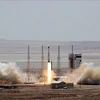 Tên lửa mang theo vệ tinh Simorgh được phóng thành công tại một địa điểm bí mật của Iran. (Ảnh tư liệu: AFP/TTXVN)
