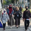 Người dân đeo khẩu trang phòng lây nhiễm COVID-19 tại Jakarta, Indonesia, ngày 19/8/2020. (Ảnh: THX/TTXVN) 