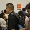 Khách tham quan tại sự kiện ra mắt sản phẩm mới của Xiaomi tại Bangalore.(Ảnh: AP)
