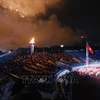 Ngọn lửa thiêng SEA Games 31 được thắp lên tại Sân vận động quốc gia Mỹ Đình (Hà Nội, Việt Nam), đánh dấu thời khắc khai mạc SEA Games 31. (Ảnh: TTXVN)