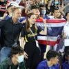 Niềm vui chiến thắng của nữ trưởng đoàn bóng đá Thái Lan Madam Pang và các cầu thủ U23 Thái Lan. (Ảnh: Thanh Tùng/TTXVN) 