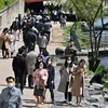Người dân đeo khẩu trang phòng dịch COVID-19 tại Seoul, Hàn Quốc. (Ảnh: AFP/TTXVN)