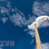 Khí thải phát ra từ một nhà máy điện than ở bang Tây Virginia, Mỹ. (Ảnh: AFP/TTXVN) 