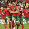 Các cầu thủ Maroc vỡ òa trong niềm vui chiến thắng. (Ảnh: THX/TTXVN) 
