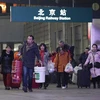 Người lao động tại thành thị đang đổ dồn về các nhà ga xe lửa trên khắp các thành phố lớn nhất của Trung Quốc.(Nguồn: AFP)