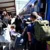 Người tị nạn từ thành phố Odessa, Ukraine, sơ tán tới Przemysl, Ba Lan. (Ảnh: PAP/TTXVN)