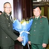 Thượng tướng Hoàng Xuân Chiến (phải), Thứ trưởng Bộ Quốc phòng đón Đại tướng Sanitchanog Sangkachantra, Thư ký Thường trực Bộ Quốc phòng Thái Lan đến dự và đồng chủ trì Đối thoại Chính sách Quốc phòng Việt Nam-Thái Lan lần thứ 5. (Ảnh: Trọng Đức/TTXVN)