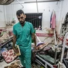 Cảnh đổ nát sau vụ không kích của Israel xuống bệnh viện Nasser ở Khan Yunis, phía Nam Dải Gaza, ngày 17/12/2023. (Ảnh: AFP/TTXVN)