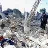 Tòa nhà bị phá hủy sau cuộc không kích của Israel xuống Naqoura, Liban, ngày 4/1/2024. (Ảnh: THX/TTXVN)