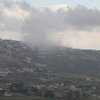 Khói bốc lên sau cuộc không kích của Israel xuống Khiam, Liban ngày 4/1/2024. (Ảnh: THX/TTXVN)