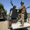 Lực lượng an ninh Iraq trong một chiến dịch truy quét IS. (Ảnh: AFP/TTXVN) 