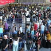 Hành khách mắc kẹt tại sân bay Frankfurt, Đức ngày 27/7/2022. (Ảnh tư liệu: AFP/TTXVN)