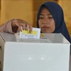 Cử tri Indonesia bỏ phiếu tại điểm bầu cử Tổng thống và bầu cử lập pháp ở Jakarta ngày 17/4/2019. (Ảnh tư liệu: AFP/TTXVN)